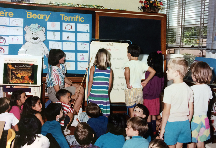 Circa 1988 photograph of students partaking in a reading lesson at Kent Gardens Elementary School.